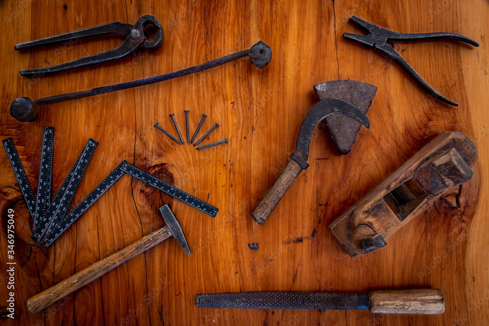 hammer, nails and other tools on wood hammer, nails and other tools on wood