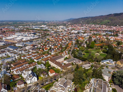 Fototapeta Naklejka Na Ścianę i Meble -  Beautiful top view on the center of Weinheim. Orange tiled roofs of houses. The old part of town. Germany.