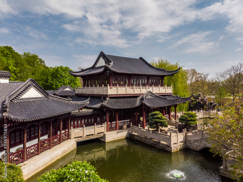 A beautiful view of a Chinese tea house in Luisenpark. Spring. Afternoon.