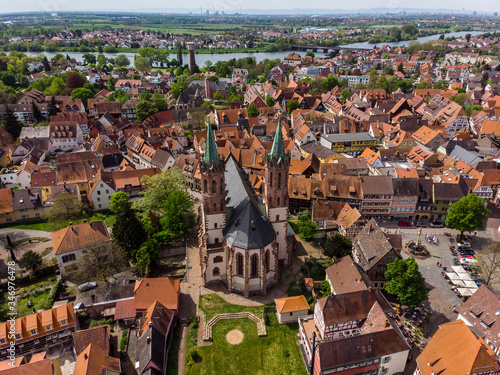 Beautiful top view of the German city of Ladenburg. Orange, tiled roofs. Catholic church. Market Square. photo