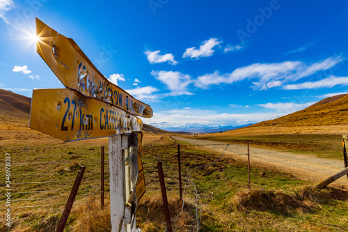 Sun Beams Down On The Hakataramea Pass Sign photo