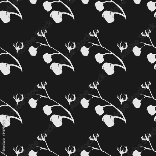 Black white is a seamless pattern. Monochrome pattern consists of flowers and leaves drawn by hand brush. A beautiful repetitive pattern of plants and flowers. Vector eps illustration.