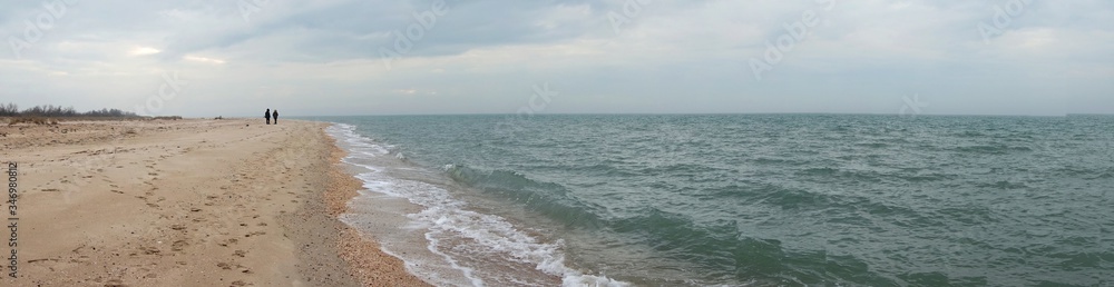 Deserted sandy beach and sea