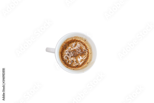 Coffee splash from a cup isolated on white background, top view