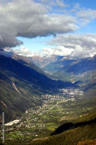 View of Chamonix Valley from Mount Blanc trekking route in French Alps, France.