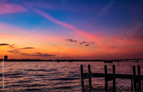 sunset over the sea, sky, pier, water, clouds, landscape, orange, evening, dusk, horizon,  © Renee