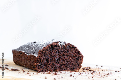 Obraz na płótnie Recipe of homemade pastry. Isolated large piece of chocolate biscuit. Homemade chocolate sweet dessert. Bake at home. w salonie