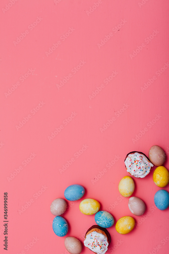 multi-colored eggs on the feast Easter background for inscriptions