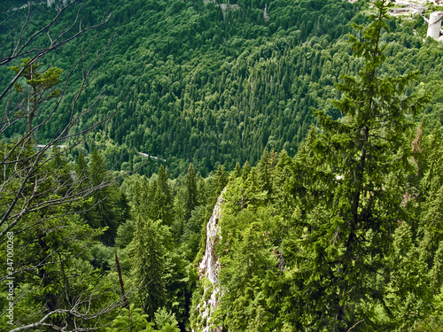 Majestic Green Mountain Peaks In The Carpathian Mountains Of Romania