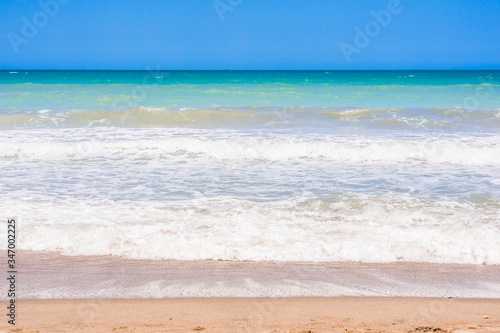 tropical beach with blue sky