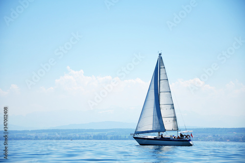 Sailing boat with all canvas open 