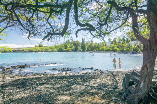 Tourists enjoying Kiholo Bay on the Big Island of Hawaii.  photo