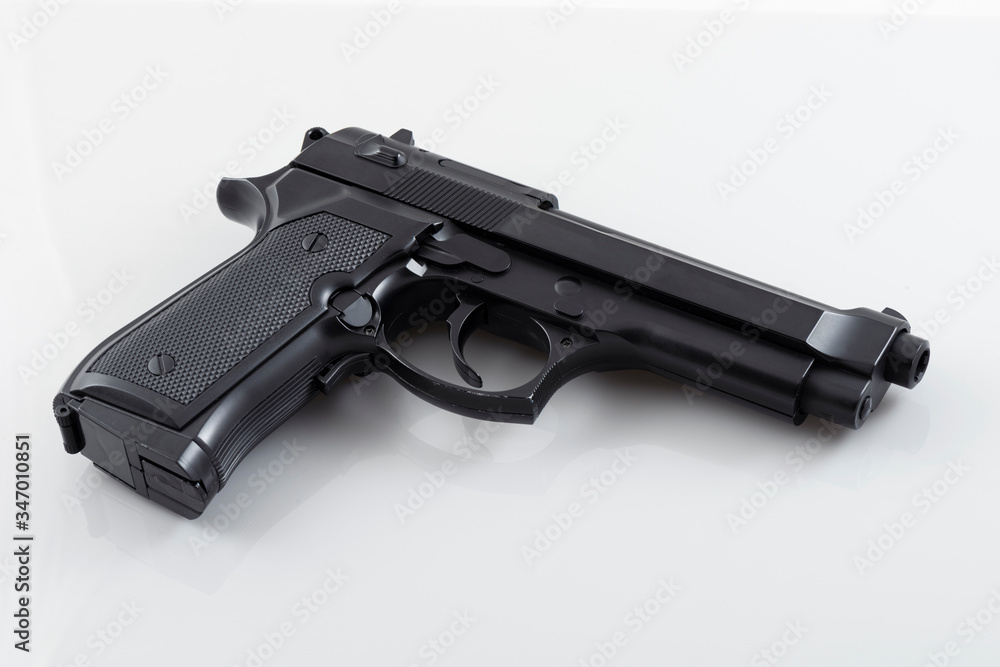Black revolver gun isolated on the white background. Black revolver gun isolated on the white background.