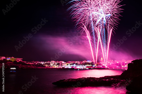 Fireworks over the sea of Porto Cristo in Majorca