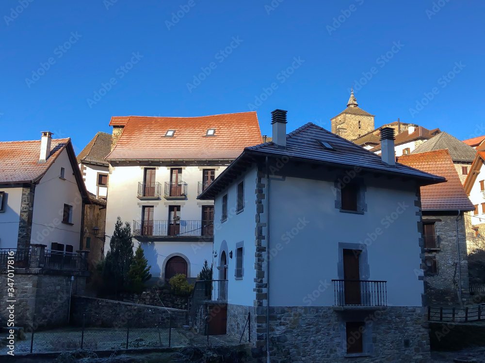 Uztarroz, a beautiful and tiny village of Valle de Roncal, the Navarrese Pyrenees, Foral Community of Navarre (Spain). The traditional architecture of the Pyrenees.
