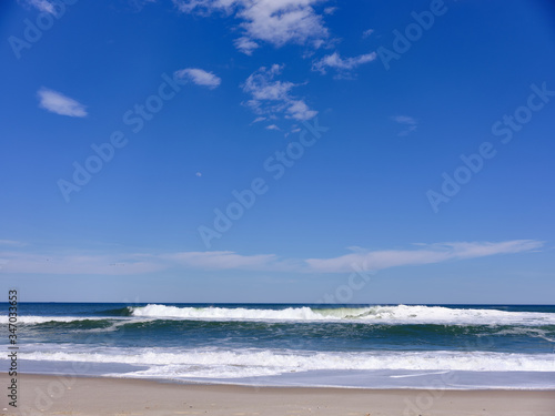 Nearly empty beaches on Island Beach state park in New Jersey the day the beaches opened during the covid-19 pandemic