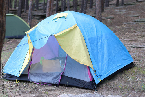 blue Camping tent in the forest  © Veta Vidru