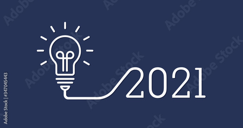 Creative light bulb idea with 2021 new year design with a light-bulb on the Dark Blue background color. the solution, planning ideas.Business, glowing