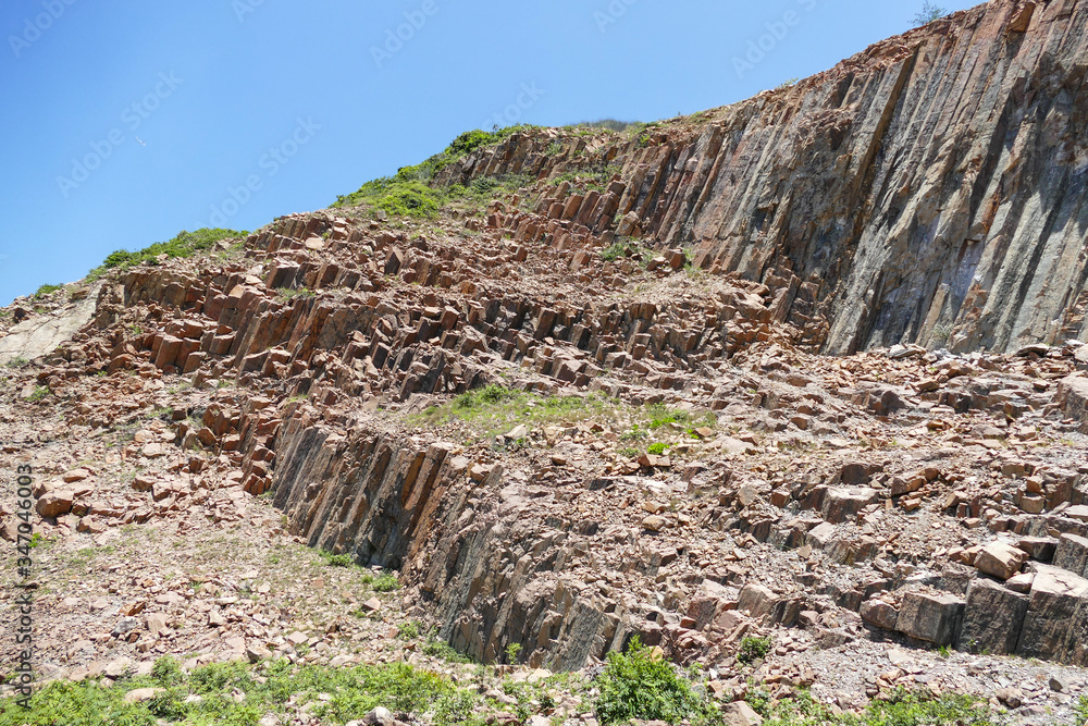 Huge hexagonal columnar joints of volcanic rock at Hong Kong Global ...
