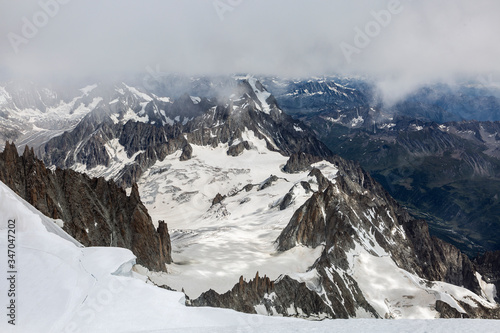 View from Mont Maudit, Mont Blanc massif. Scenic image of hiking concept. French Alps, Chamonix, France