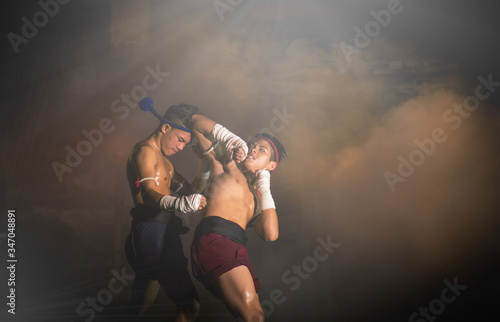 Fototapeta Naklejka Na Ścianę i Meble -  Martial arts of Muay Thai,Thai Boxing, Muay Thai