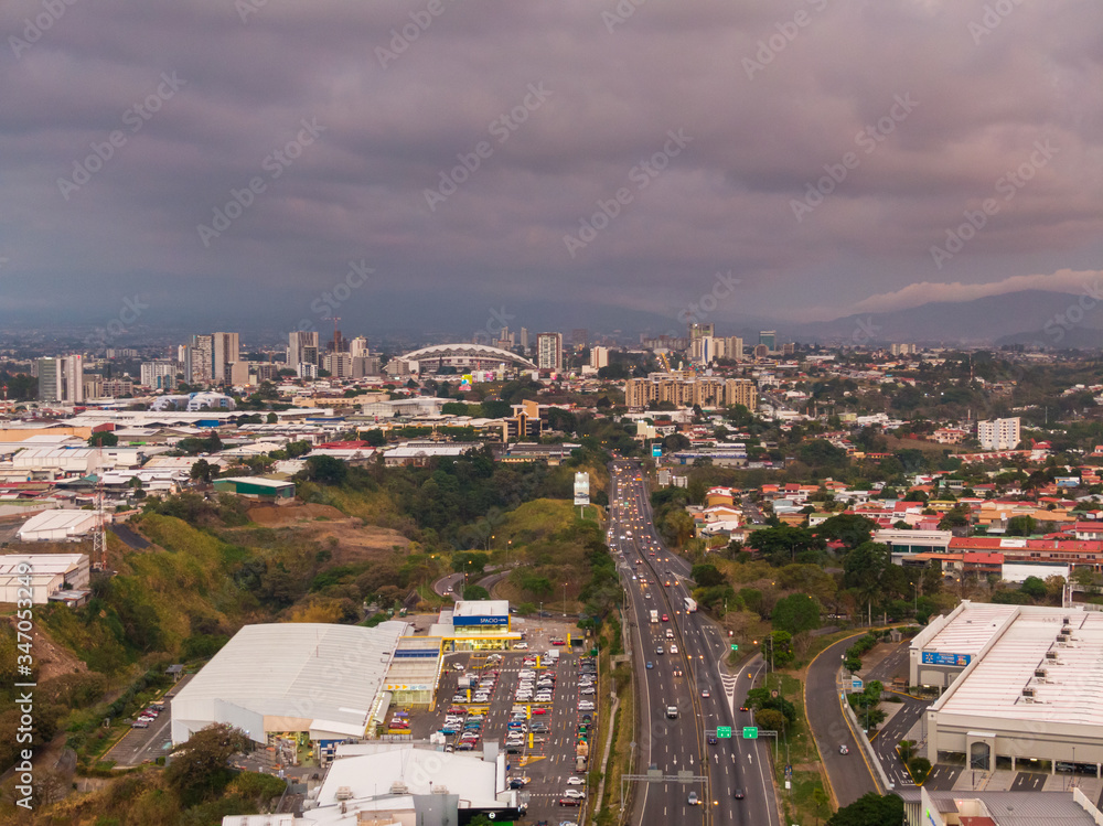 Fototapeta premium Impressive aerial view of the city of San Jose with view to the Sabana park 
