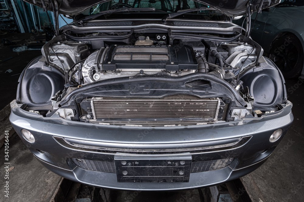 Fototapeta premium Car engine close-up. Internal combustion engine, car parts, deteyling. Parsing jankyard.