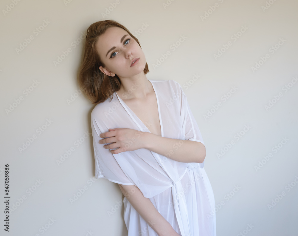 Portrait of a beautiful young woman with blue eyes. Portrait of a beautiful young woman with blue eyes.