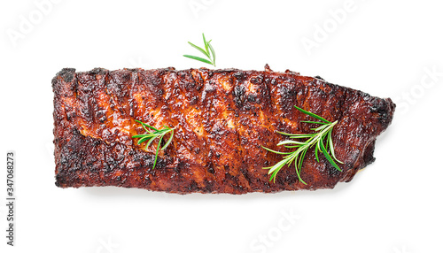 Grilled and smoked pork ribs with barbeque sauce and rosemary isolated on white background