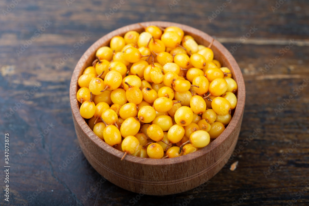 raw sea buckthorn in a plate raw sea buckthorn in a plate