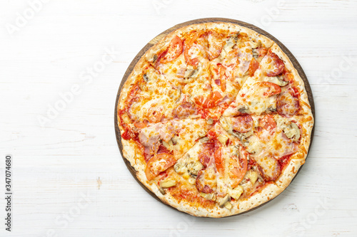 italian pizza on wooden background