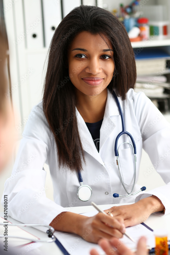 Beautiful black smiling female doctor talk with Beautiful black smiling female doctor talk with
