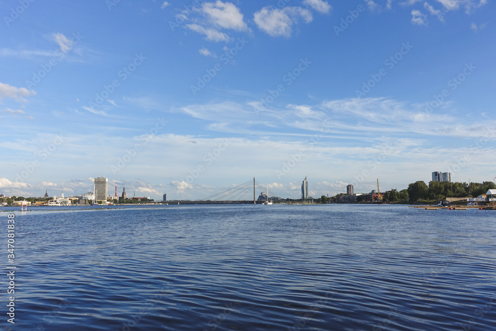 View across the river Daugava to the cable-stayed bridge and the city on the opposite bank, Riga, Latvia