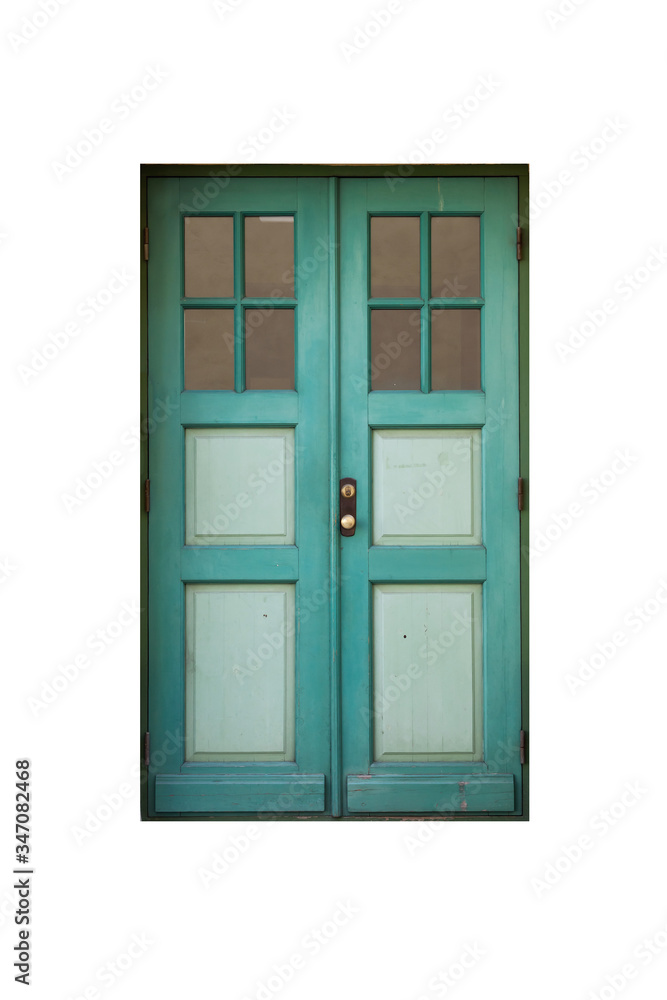 Green wooden door with windows in old building facade Green wooden door with windows in old building facade