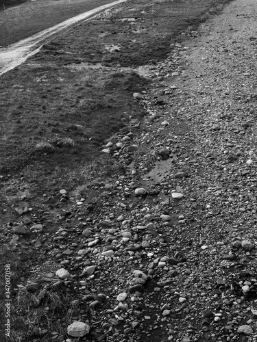rock river bank in black and white