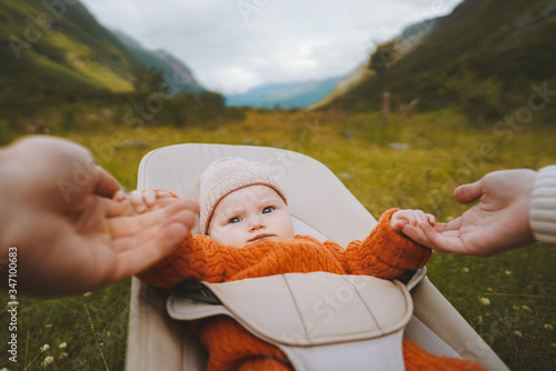 Tableau sur toile Baby infant in bouncer outdoor family travel lifestyle mother…