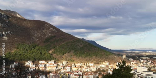 Panorama view of Vratsa, Bulgaria from the Horseman statue, video of beautiful spring day with church bells in the air, mountains and pretty clouds photo