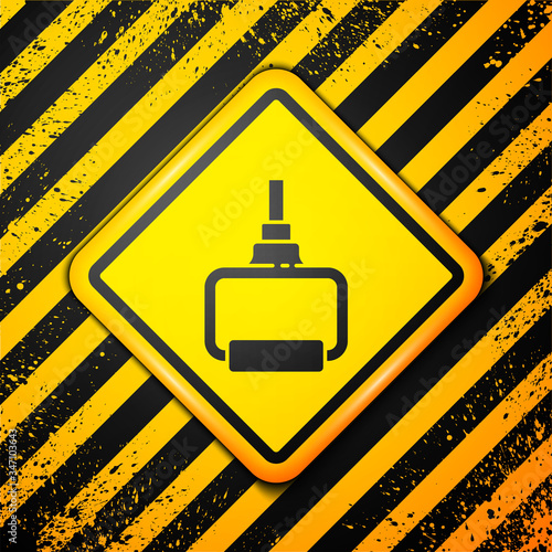Black TPX loop training equipment icon isolated on yellow background. Sport equipment. Warning sign. Vector Illustration