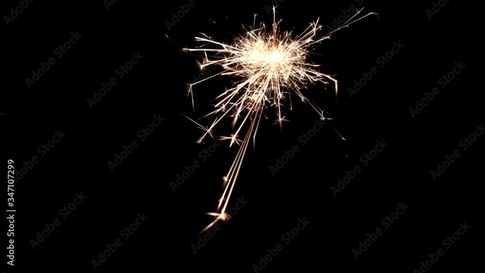 sparkler burning on black sparkler burning on black