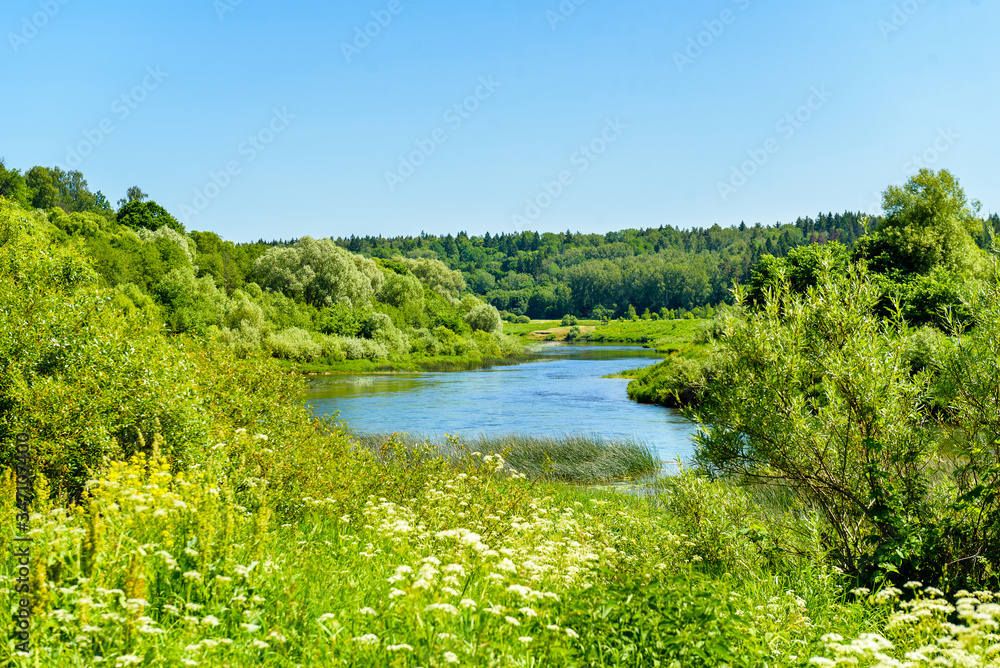 river valley among green banks river valley among green banks