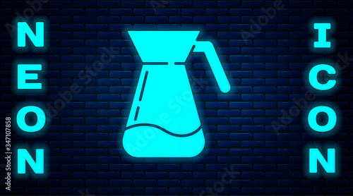Glowing neon Jug glass with water icon isolated on brick wall background. Kettle for water. Glass decanter with drinking water.  Vector Illustration