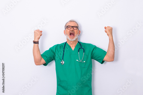 doctor with work clothes and stethoscope isolated on white background