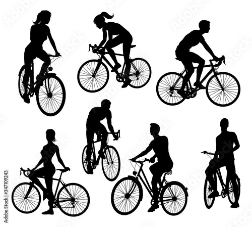 A set of bicycle cyclists riding their bikes in silhouette
