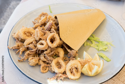 Mixed fried seafood in a plate  photo