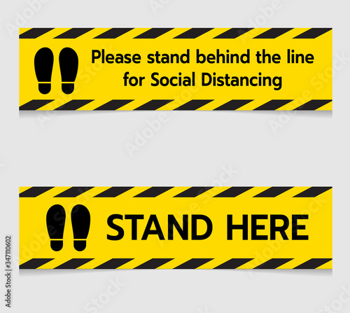 Alert Notice text "Stand here" for stick on floor in concept social distancing Corona virus outbreak