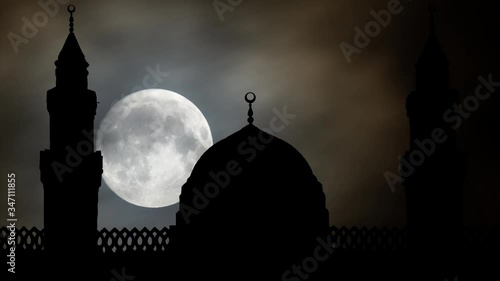 Medina, Saudi Arabia: Masjid al-Qiblatayn by Night, Time Lapse with Full Moon and Silhouette of Qiblatain Mosque photo