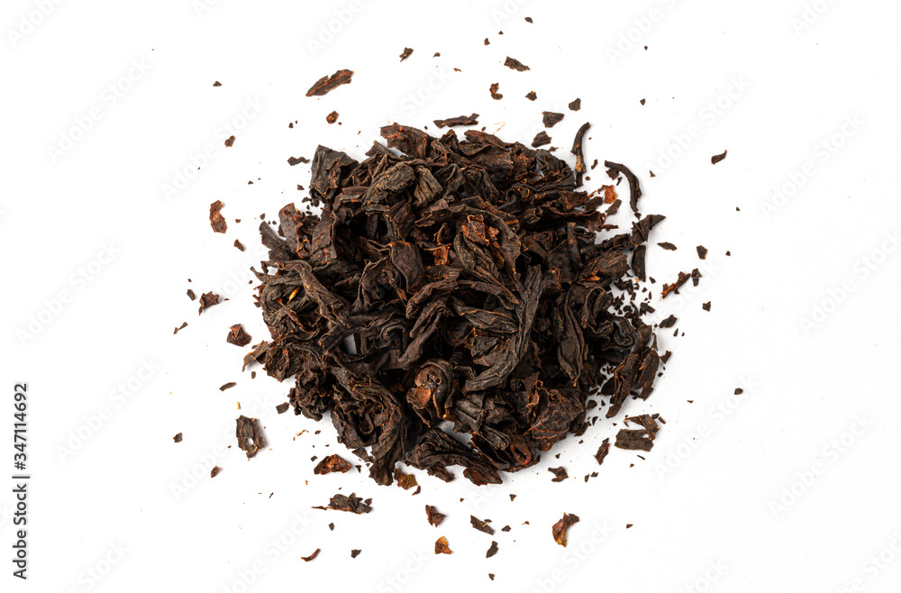Dry black tea leaves isolated on white background, top view Dry black tea leaves isolated on white background, top view