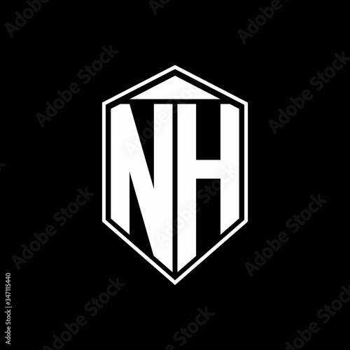 NH logo monogram with emblem shape combination tringle on top design template photo