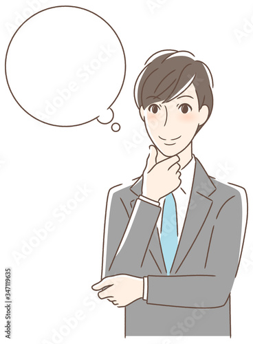 笑顔で想像する男性