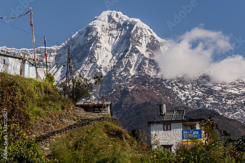 Views of Annapurnas mountains  from Chomrong, Nepal during a trekking to Annapurna Base Camp  photo